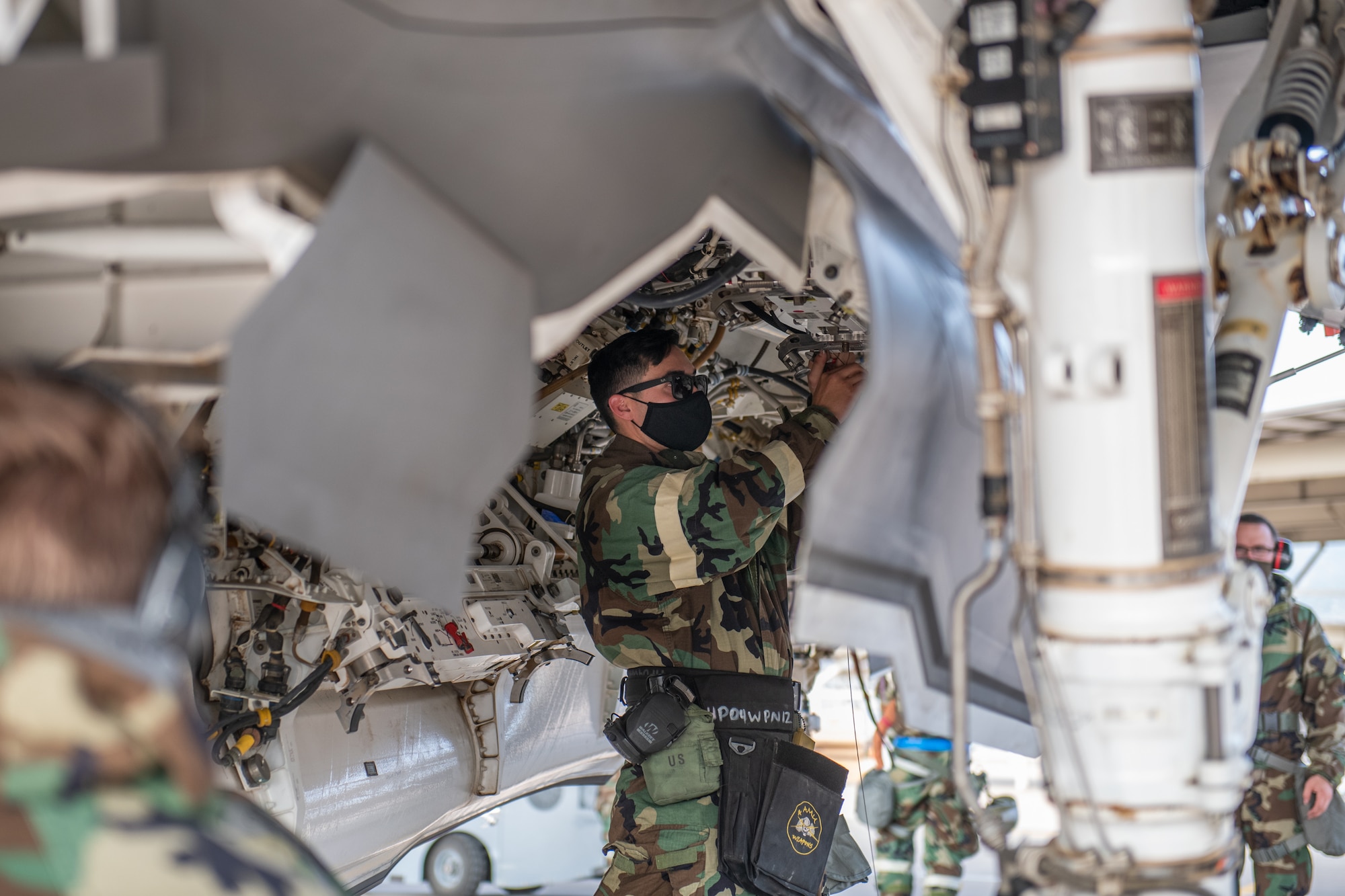 Staff Sgt. Justin Crosby, a reservist in the 419th Aircraft Maintenance Squadron, prepares an F-35A Lightning II to receive munitions