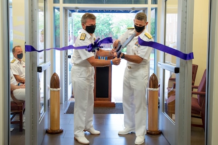 Vice Adm. Andrew Lewis, commander, Joint Force Command Norfolk (JFCNF) and U.S. 2nd Fleet, alongside Rear Adm. Andrew Betton, Deputy Commander, Joint Force Command Norfolk, cut the ribbon to commemorate JFCNF's achievement of initial operational capability (IOC), Sept. 17.