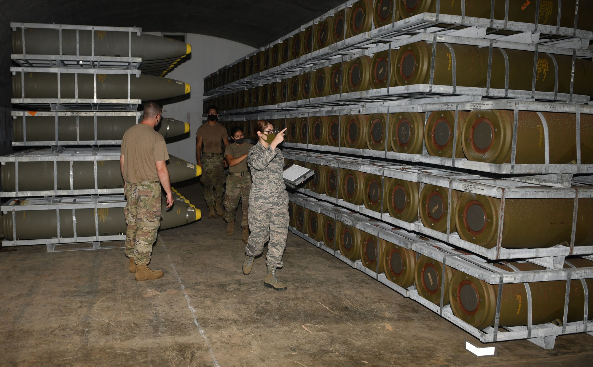 Airmen count munitions.