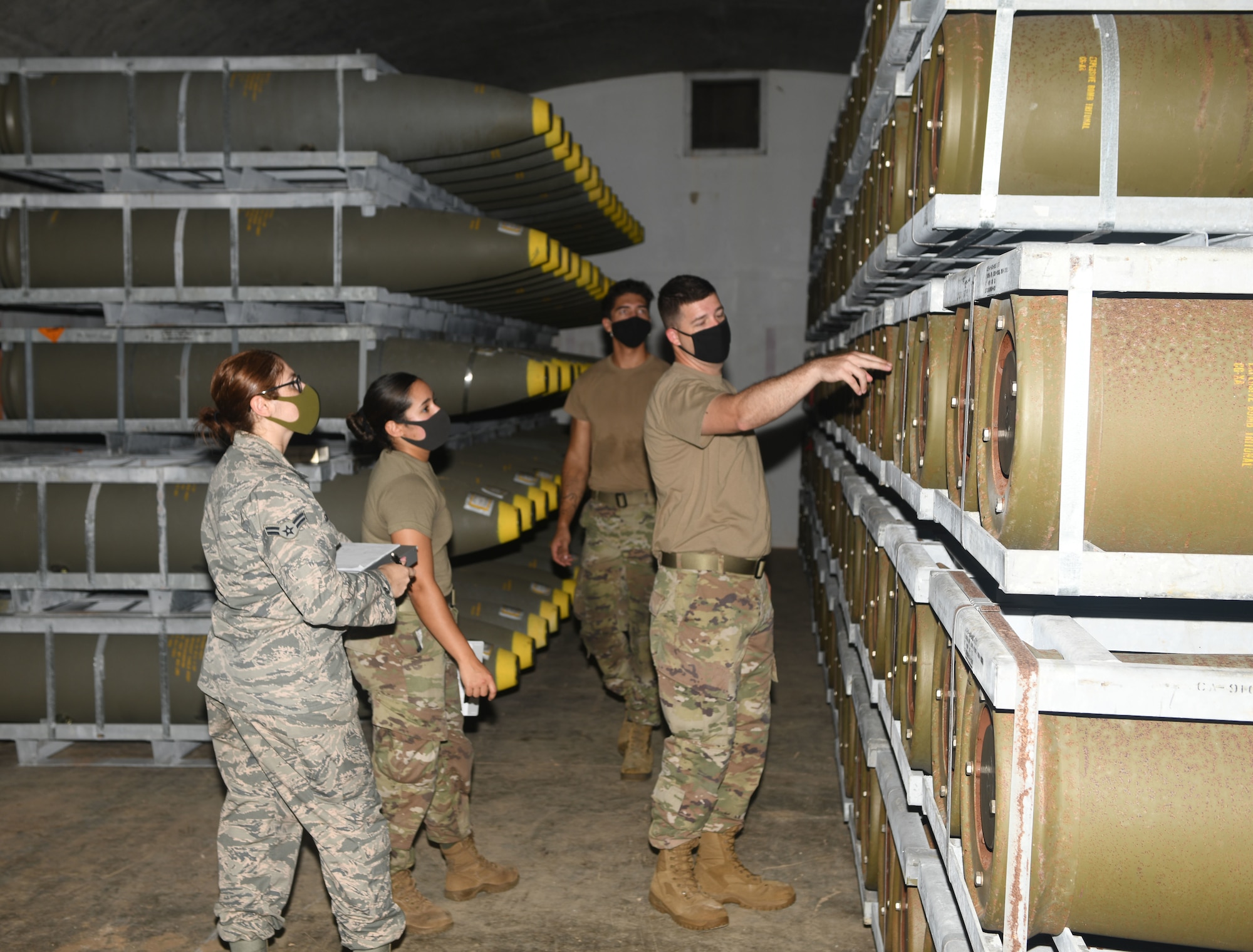 Airmen count munitions.