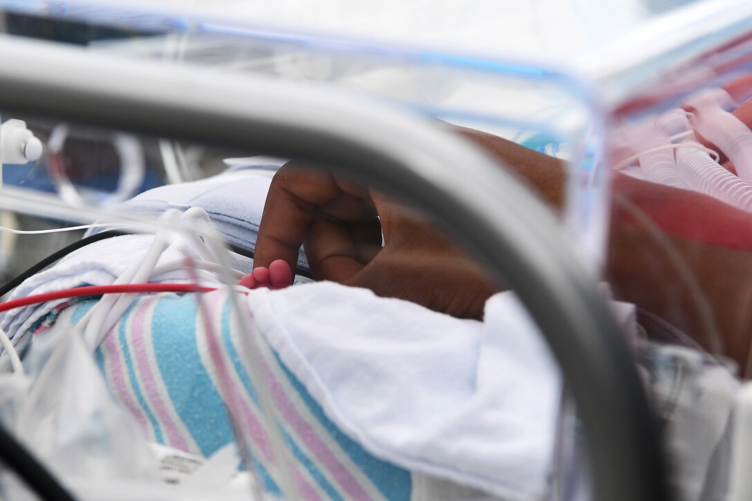 Nehemiah, son of Davion and Rejeya Miller, awaits transport to Hawaii’s Tripler Army Medical Center during a specialized neo-natal care medical evacuation, Sept. 17, 2020, at Osan Air Base, Republic of Korea. Born a 25-week old premature baby affected by birth complications, the Miller’s, a family formerly assigned to Camp Humphrey’s, will relocate to Hawaii to continue receiving the best care. (U.S. Air Force photo by Senior Airman Noah Sudolcan)