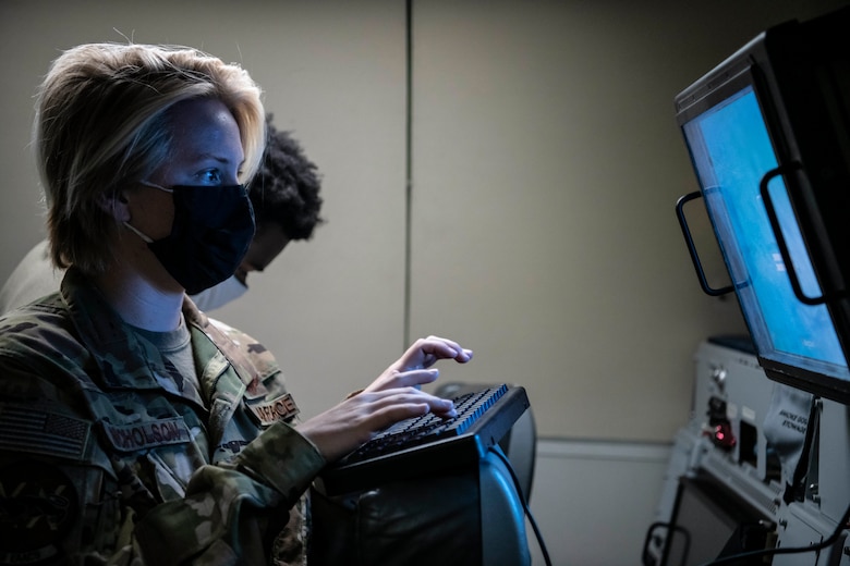 Lieutenant Col. Jeff Waterman, 968th Expeditionary Airborne Air Control Squadron, 968 EAACS director of operations, performs a pre-flight check on his oxygen mask before take-off at Al Dhafra Air Base, United Arab Emirates Sept. 15, 2020. Deployed Airmen from the 968 EAACS provide continuous Battle Management Command and Control for over 5,000 aircraft to include Defensive Counter Air, Close Air Support, Remotely Piloted Aircraft, Tanker, and Intelligence, Surveillance, and Reconnaissance assets. (U.S. Air Force photographer by Master Sgt. Patrick OReilly)