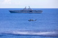 An MH-60R Sea Hawk helicopter attached to Helicopter Marine Strike Squadron (HSM) 46 prepares to lower a dipping sonar transducer during anti-submarine warfare (ASW) training with the amphibious assault ship USS Wasp (LHD 1).