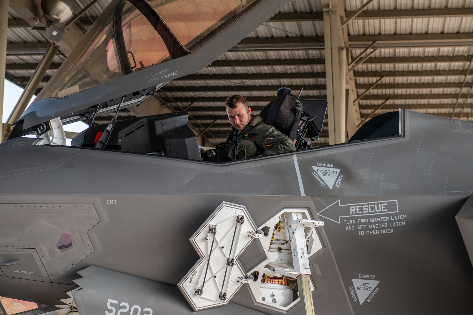 Capt. Dylan Meador, F-35 pilot in the 388th Fighter Wing, performs post-flight checks after leading two consecutive offensive counter-air sorties during an exercise