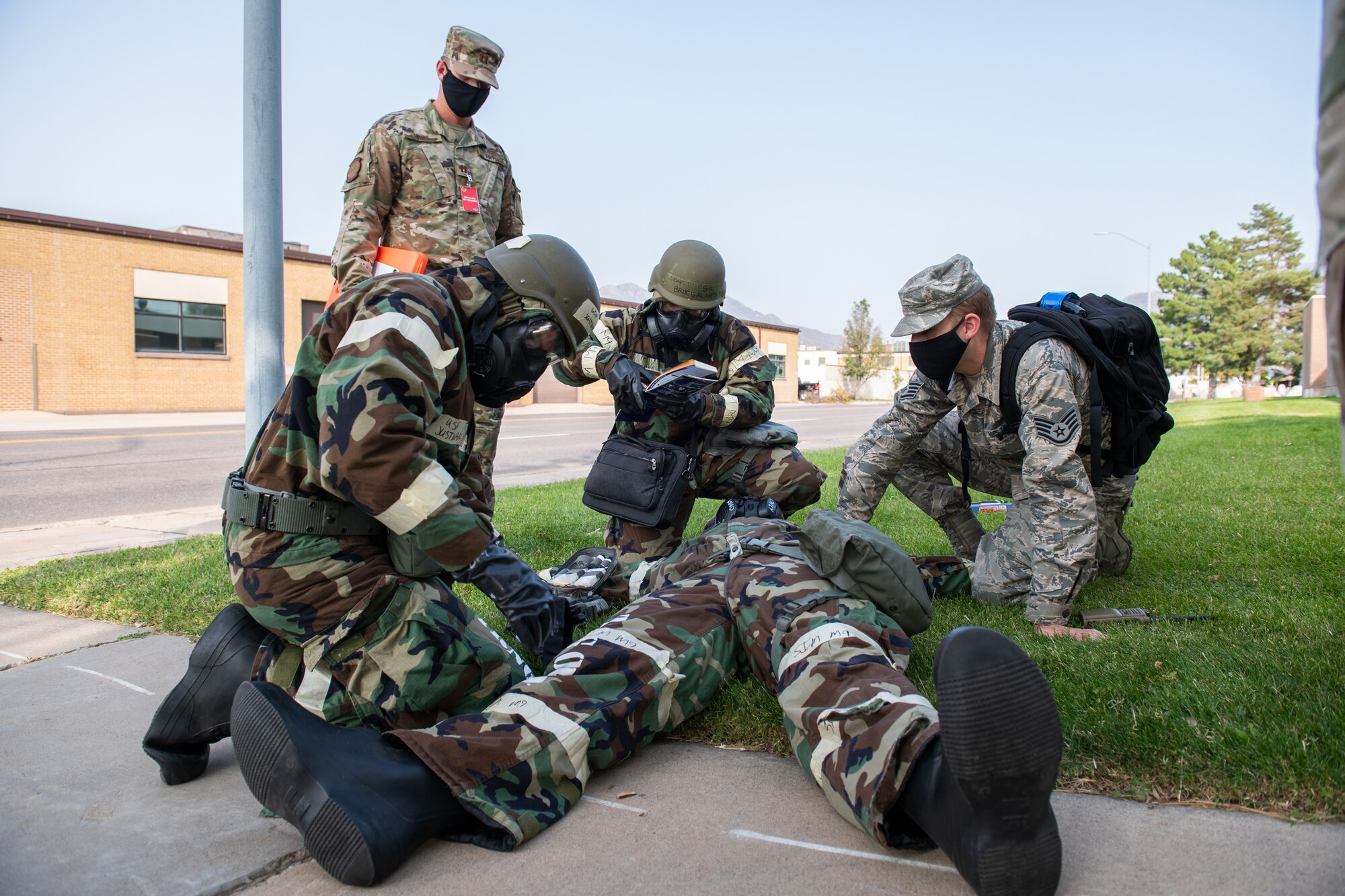 Airmen from the 388th Operations Support Squadron and the 419th Operations Support Squadron render self-aid buddy care to a fellow Airman during a training exercise
