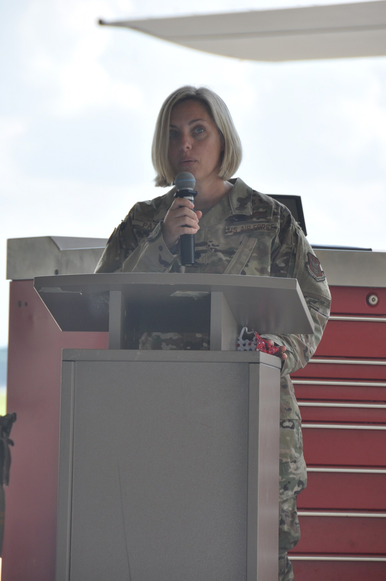 person speaking to a crowd