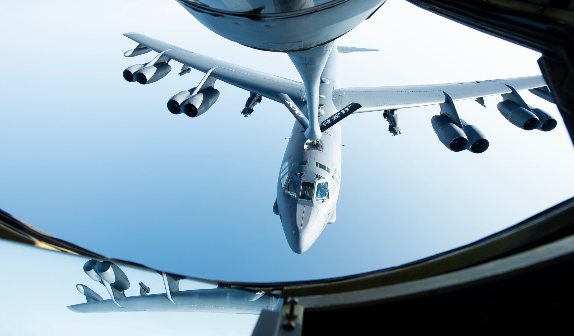 A U.S. Air Force B-52H Stratofortress, assigned to the 5th Bomb Wing at Minot Air Force Base, North Dakota, flies below a KC-135 Stratotanker from the 100th Air Refueling Wing, RAF Mildenhall, England, after receiving fuel above the Mediterranean Sea in support of a Bomber Task Force Europe mission, Sept. 16, 2020. The B-52s are deployed to RAF Fairford, England, in support of joint and combined training with U.S allies and partners. (U.S. Air Force photo by Senior Airman Jennifer Zima)