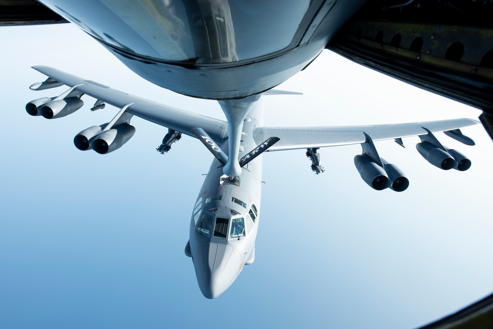 A U.S. Air Force B-52H Stratofortress, assigned to the 5th Bomb Wing at Minot Air Force Base, North Dakota, flies below a KC-135 Stratotanker from the 100th Air Refueling Wing, RAF Mildenhall, England, after receiving fuel above the Mediterranean Sea in support of a Bomber Task Force Europe mission, Sept. 16, 2020. The B-52s are deployed to RAF Fairford, England, in support of joint and combined training with U.S allies and partners. (U.S. Air Force photo by Senior Airman Jennifer Zima)