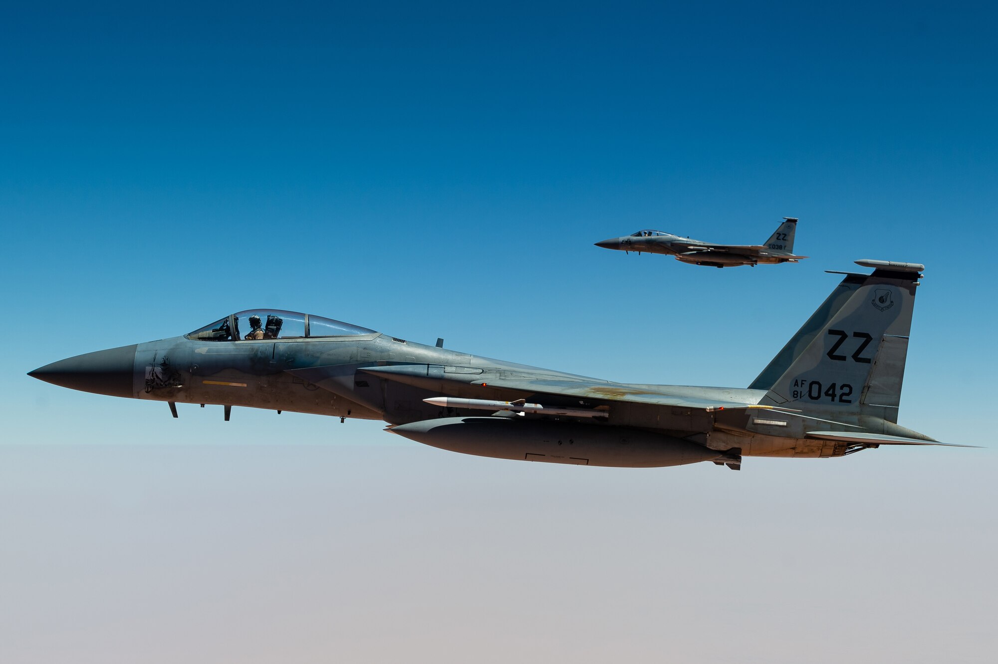 A U.S. Air Force KC-135 Stratotanker refuels F-15C Eagles