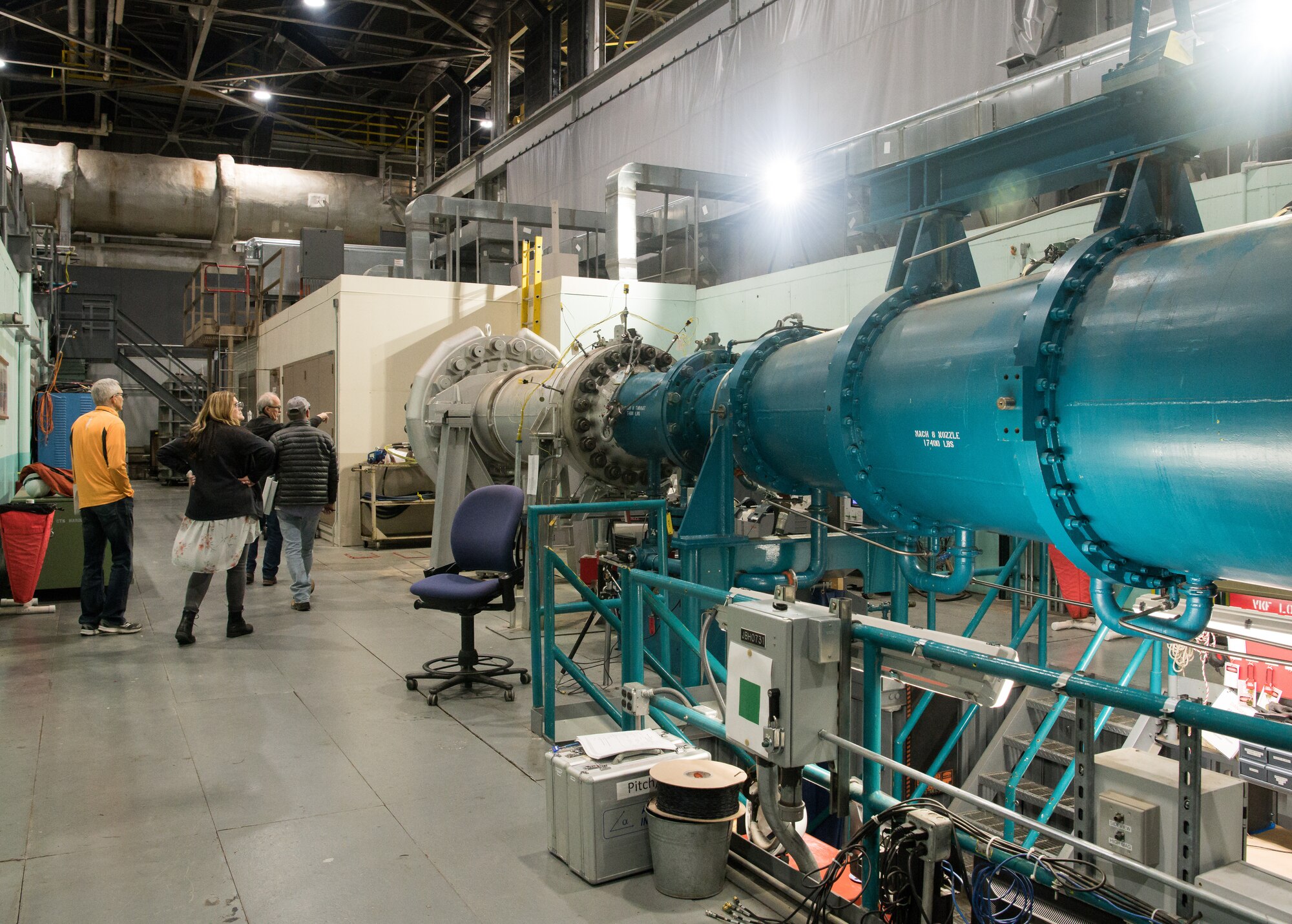 Arnold Engineering Development Complex team members look at Tunnel B in the von Kármán Gas Dynamics Facility at Arnold Air Force Base, Tenn., March 12, 2020. The wind tunnel is used to conduct aerodynamic testing at hypersonic speeds. (U.S. Air Force photo by Jill Pickett)