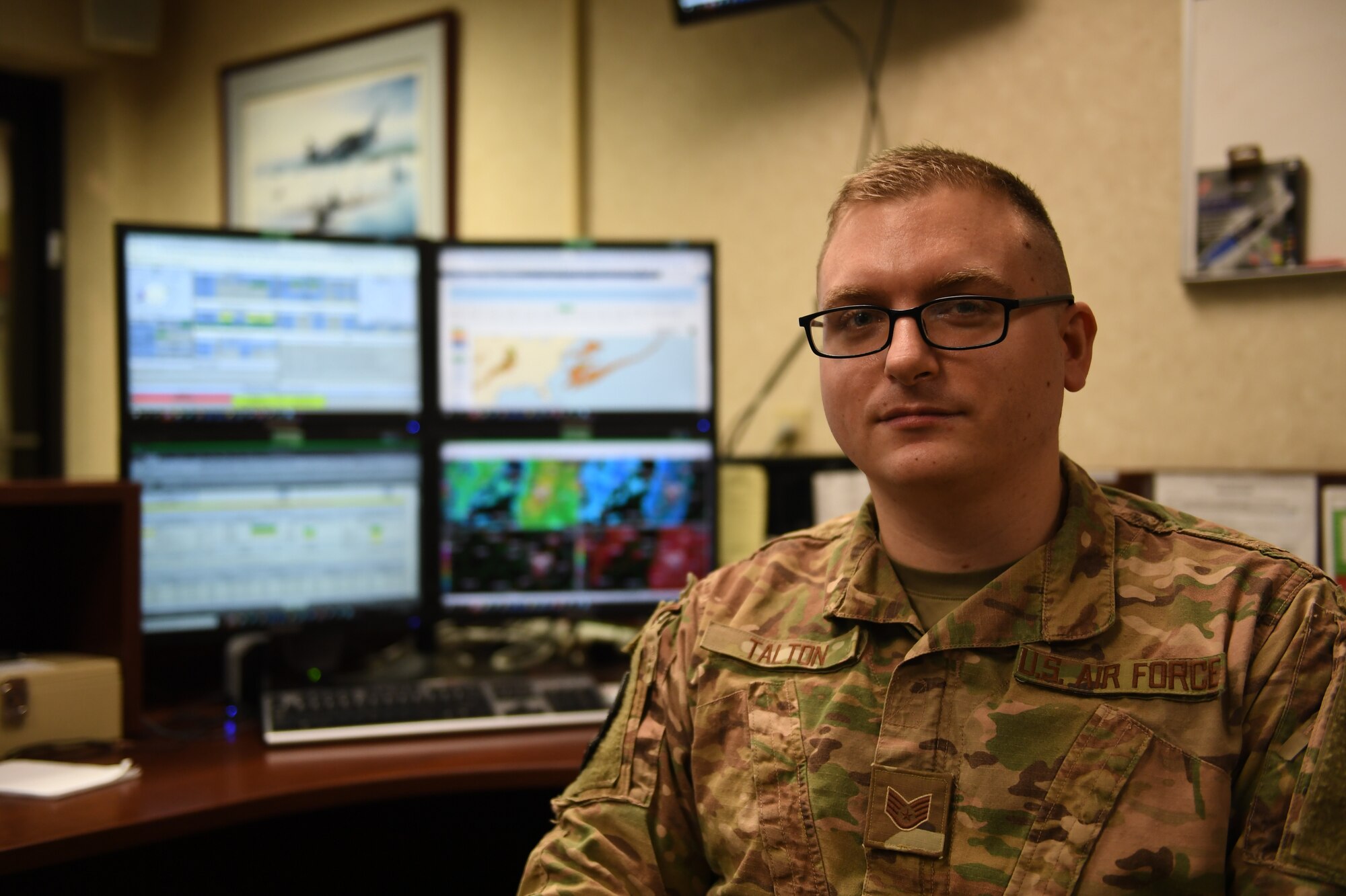 An Airman poses for a photo