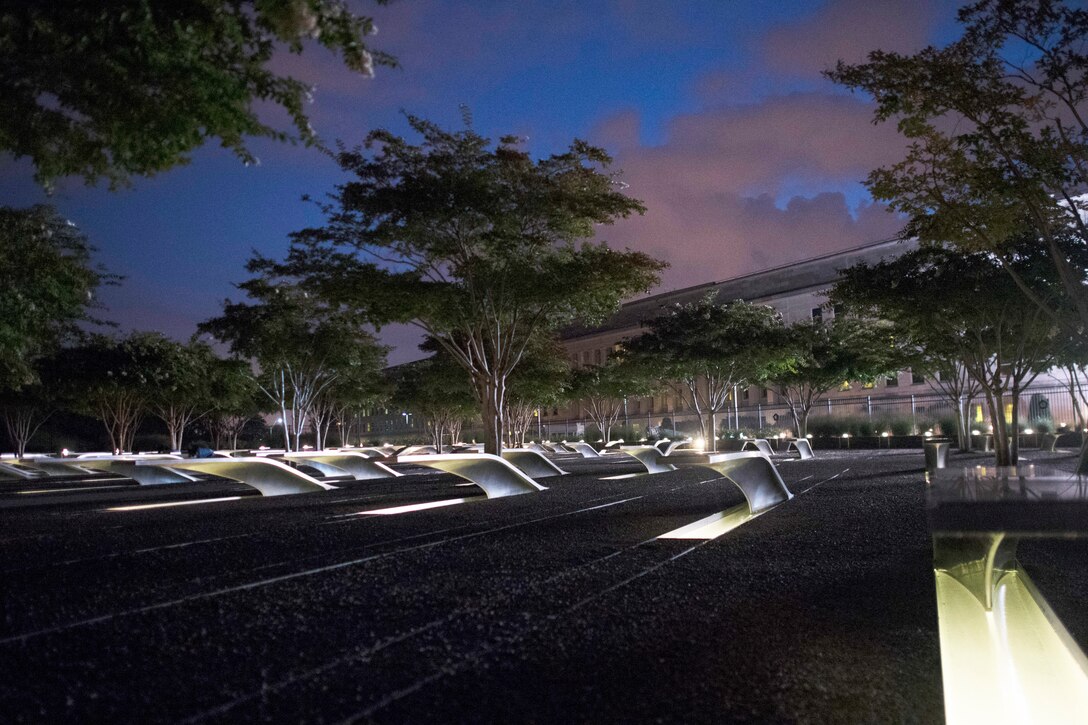 The National 9/11 Pentagon Memorial is seen at dawn.