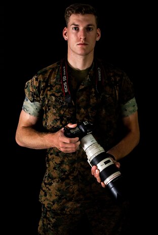 U.S. Marine Corps Cpl. Nathaniel Q. Hamilton, a native of Harve De Grace, Maryland, and a Combat Photographer with Headquarters Battalion, 2nd Marine Division, poses for a photo on Camp Lejeune, N.C., Sept. 17, 2020. Hamilton was chosen as the 2nd Marine Division motivator of the week for his outstanding leadership and unyielding motivation. (U.S. Marine Corps photo by Lance Cpl. Brian Bolin Jr.)