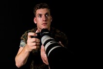 U.S. Marine Corps Cpl. Nathaniel Q. Hamilton, a native of Harve De Grace, Maryland, and a Combat Photographer with Headquarters Battalion, 2nd Marine Division , poses for a photo on Camp Lejeune, N.C., Sept. 17, 2020. Hamilton was chosen as the 2nd Marine Division motivator of the week for his outstanding leadership and unyielding motivation. (U.S. Marine Corps photo by Lance Cpl. Brian Bolin Jr.)