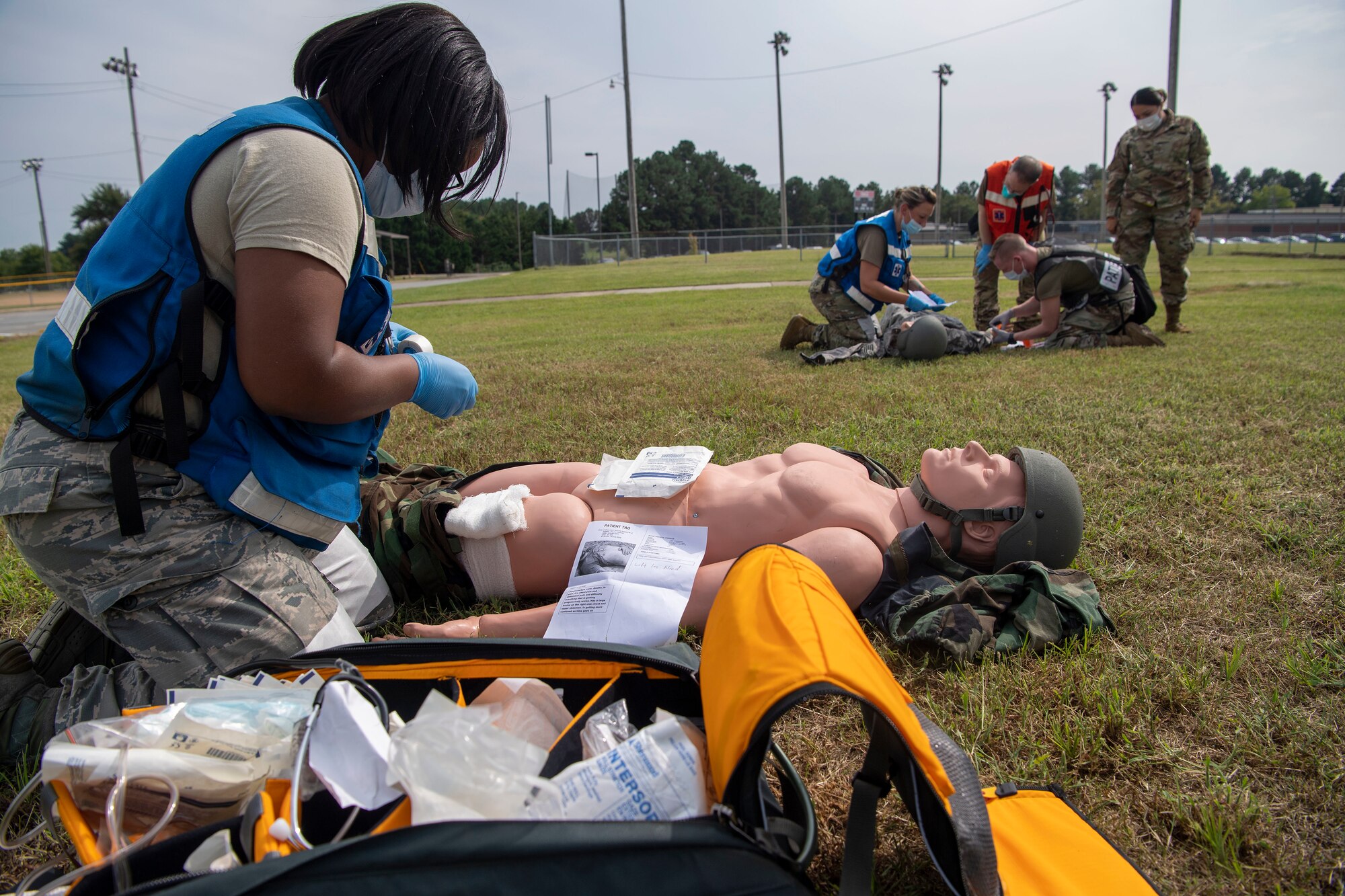 Medical Airmen simulate medical care during an exercise.