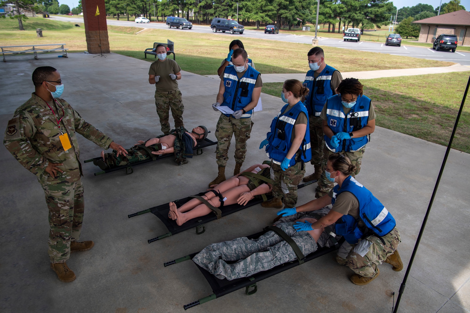 Medical Airmen simulate medical care during an exercise.