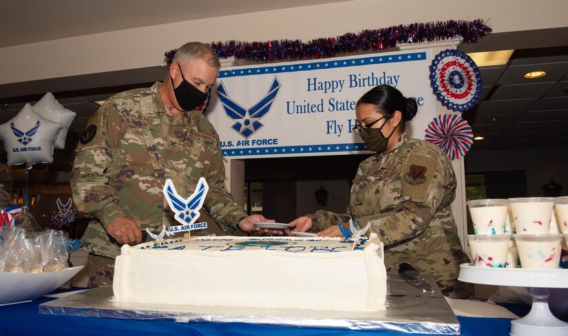 Airmen plate pieces of cake at Joint Base Langley-Eustis, Virginia.