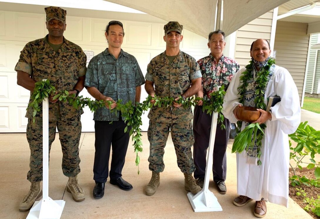Marine Corps Base Hawaii and Hunt Military Communities celebrated the completion of a new 40 home redevelopment of the Nani Ulupa’u neighborhood with a traditional Hawaiian blessing ceremony, July 8, 2020. Col. Speros Koumparakis, the MCBH commanding officer, and Sgt. Maj. Lester Williams, the base sergeant major, were among those involved with the project’s celebration ceremony; also in attendance were Hunt community managers, development and operations employees, and Hunt community residents.