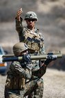 U.S. Marine Corps Sgt. Raymond Lumpkin, platoon sergeant, Echo Company, 2nd Battalion, 3rd Marine Regiment, observes as a U.S. Marine with Detachment 4th Force Reconnaissance Company prepares to fire an M72 LAW weapon system, Marine Corps Base Hawaii, Aug. 13, 2020. The training was supplementary to 4th Force’s annual reserve training, and aimed to foster familiarity and confidence with the M72 LAW weapon system. (U.S. Marine Corps photo by Sgt. Luke Kuennen)