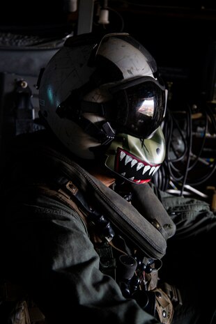 A U.S. Marine Corps crew chief with Marine Medium Tiltrotor Squadron 268 looks out the rear of an MV-22 Osprey over Oahu, Hawaii, Sept. 3, 2020. The joint training improved interoperability between Marine aircraft and U.S. Air Force Tactical Air Control Party specialists across Oahu. (U.S. Marine Corps photo by Sgt. Jesus Sepulveda Torres)