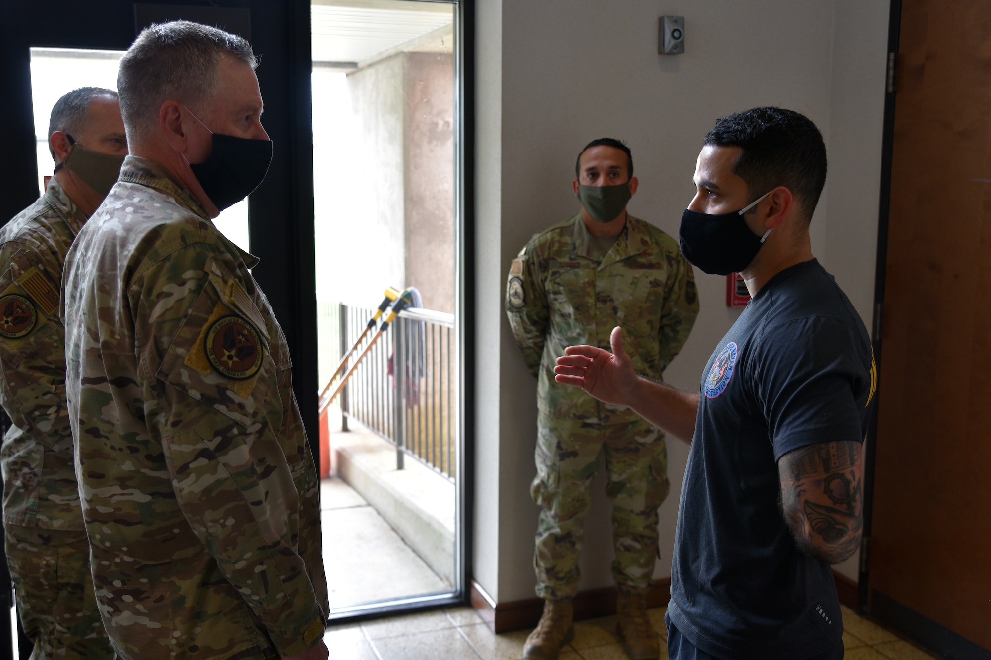 Tech. Sgt. Gabriel Rosario, Non-commissioned Officer in Charge of the Phoenix Raven Qualification Course, 421st Combat Training Squadron, provides an overview of the Phoenix Raven Qualification Course to Lt. Gen. Brad Webb, commander of Air Education and Training Command, during his visit to the U.S. Air Force Expeditionary Center at Joint Base McGuire-Dix-Lakehurst, New Jersey on Sept. 18, 2020. Implemented in February 1997 and launched at the then Air Mobility Warfare Center, at Fort Dix, the Phoenix Raven Program ensures protection for Air Mobility Command aircraft operating out of airfields where security is unknown or inadequate. Teams of specially trained and equipped security forces personnel, known as Ravens deploy onboard AMC aircraft. Webb and Chief Master Sgt. Erik Thompson, Command Chief Master Sergeant, Headquarters AETC, visited the USAF EC to gain a better understanding of the Center’s mission as the Air Force's Center of excellence for Rapid Global Mobility and expeditionary Agile Combat Support training and education, while also providing direct oversight for the Global Air Mobility Support System and installation support, contingency response, and building partnership capacity mission sets within the global mobility enterprise. (U.S. Air Force photo by Maj. George Tobias)