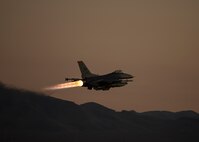 Aircraft takes off from the flight line.