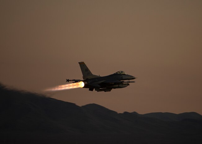 Aircraft takes off from the flight line.