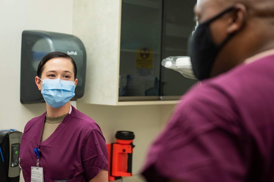 Staff Sgt. Heather Cirilli, 341st Operational Medical Readiness Squadron dental technician, discusses her day-to-day job with Chief Master Sgt. Ron Harper, 341st Missile Wing command chief, Sept. 16, 2020, at Malmstrom Air Force Base, Mont.