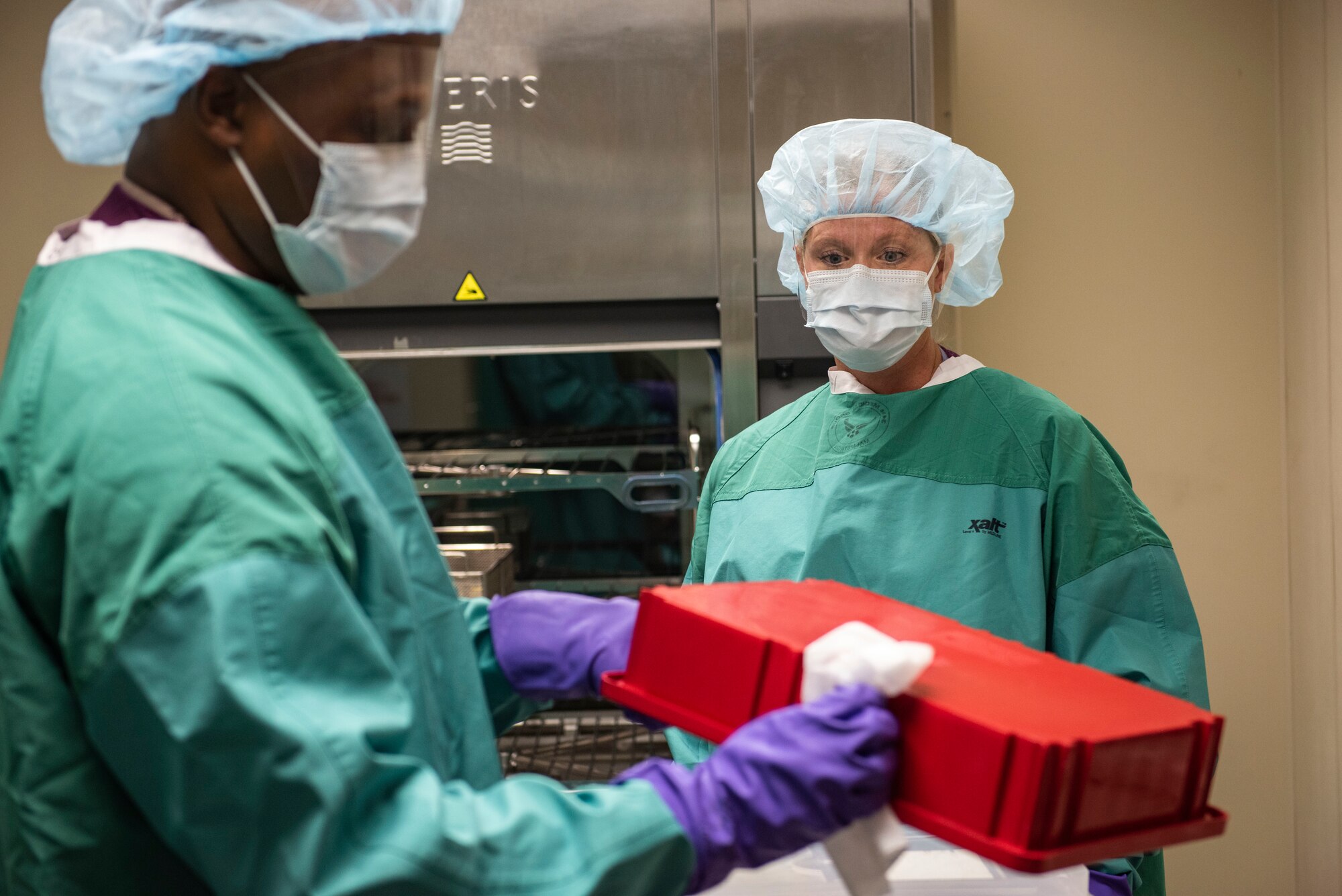Chief Master Sgt. Ron Harper, 341st Missile Wing command chief, and Tech. Sgt. Jessica Chobot, 341st Operational Medical Readiness Squadron dental technician, clean dental tools Sept. 16, 2020, at Malmstrom Air Force Base, Mont.