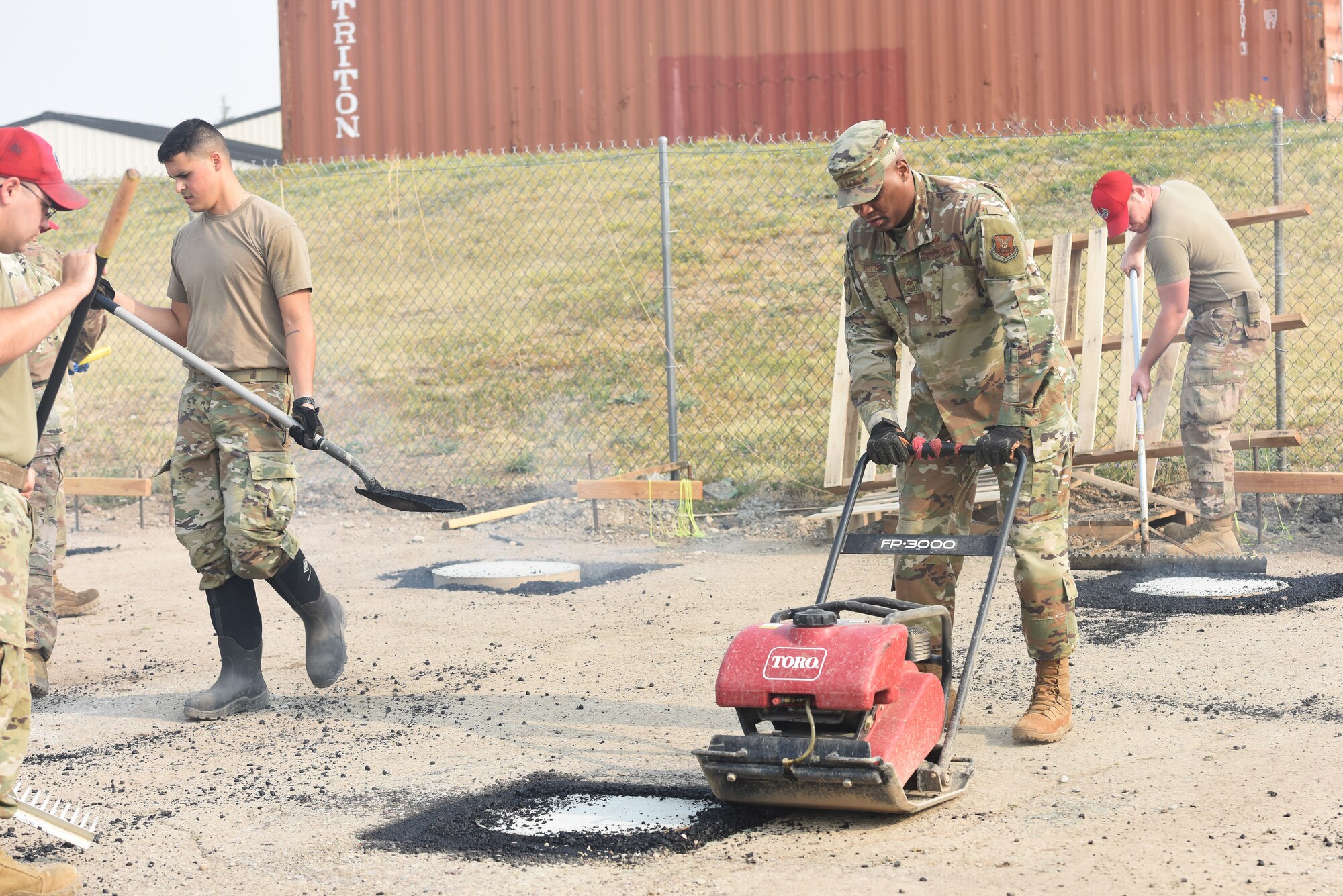 Chief Master Sgt. Ron Harper, 341st Missile Wing command chief, works with Airmen from the 819th RED HORSE Squadron and the 341st Civil Engineer Squadron Sept. 17, 2020, at Malmstrom Air Force Base, Mont.