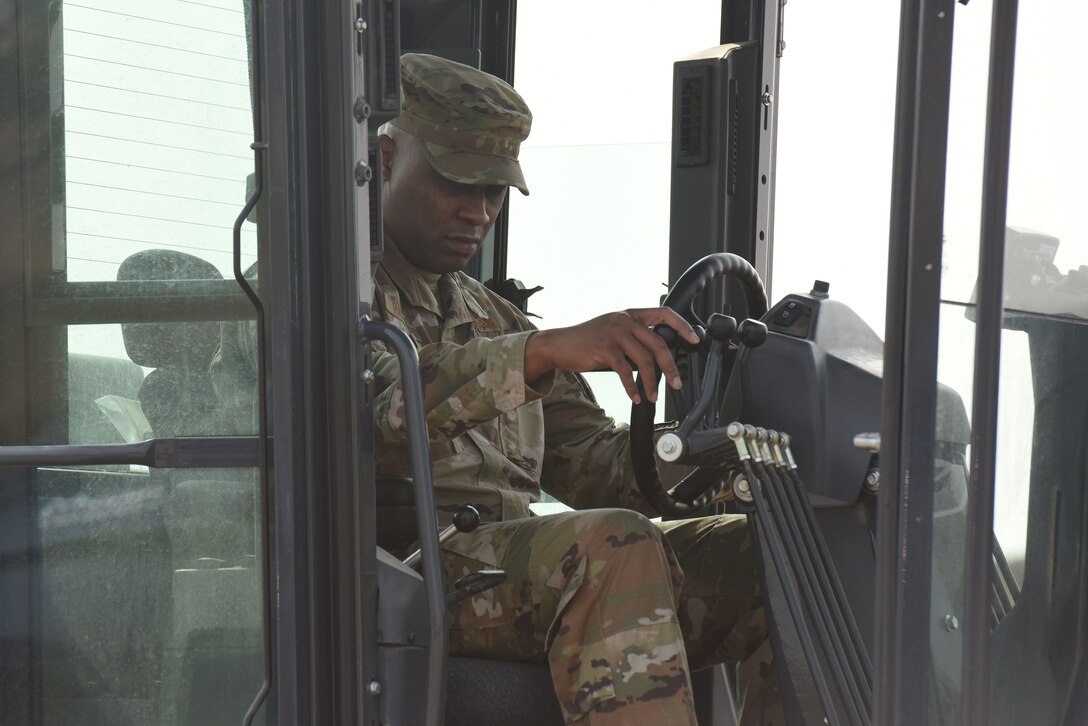 Chief Master Sgt. Ron Harper, 341st Missile Wing command chief, operates heavy equipment Sept. 17, 2020, at Malmstrom Air Force Base, Mont.