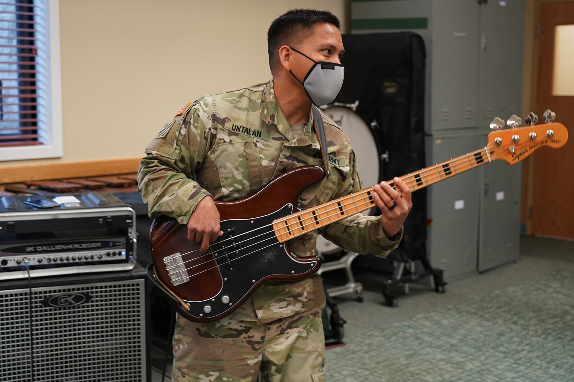 Army Sgt. Johndavid Untalan, a native of Dededo, Guam, and bassist assigned to the 9th Army Band, 17th Combat Sustainment Support Battalion, U.S. Army Alaska, rehearses in an open room at his unit headquarters on Joint Base Elmendorf-Richardson, Alaska, Sept. 17, 2020.