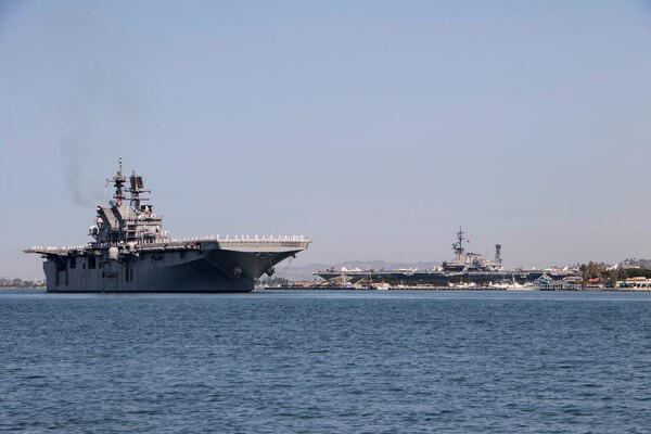 The Navy's newest America-class amphibious assault ship USS Tripoli (LHA 7) arrives at its new homeport at Naval Base San Diego.