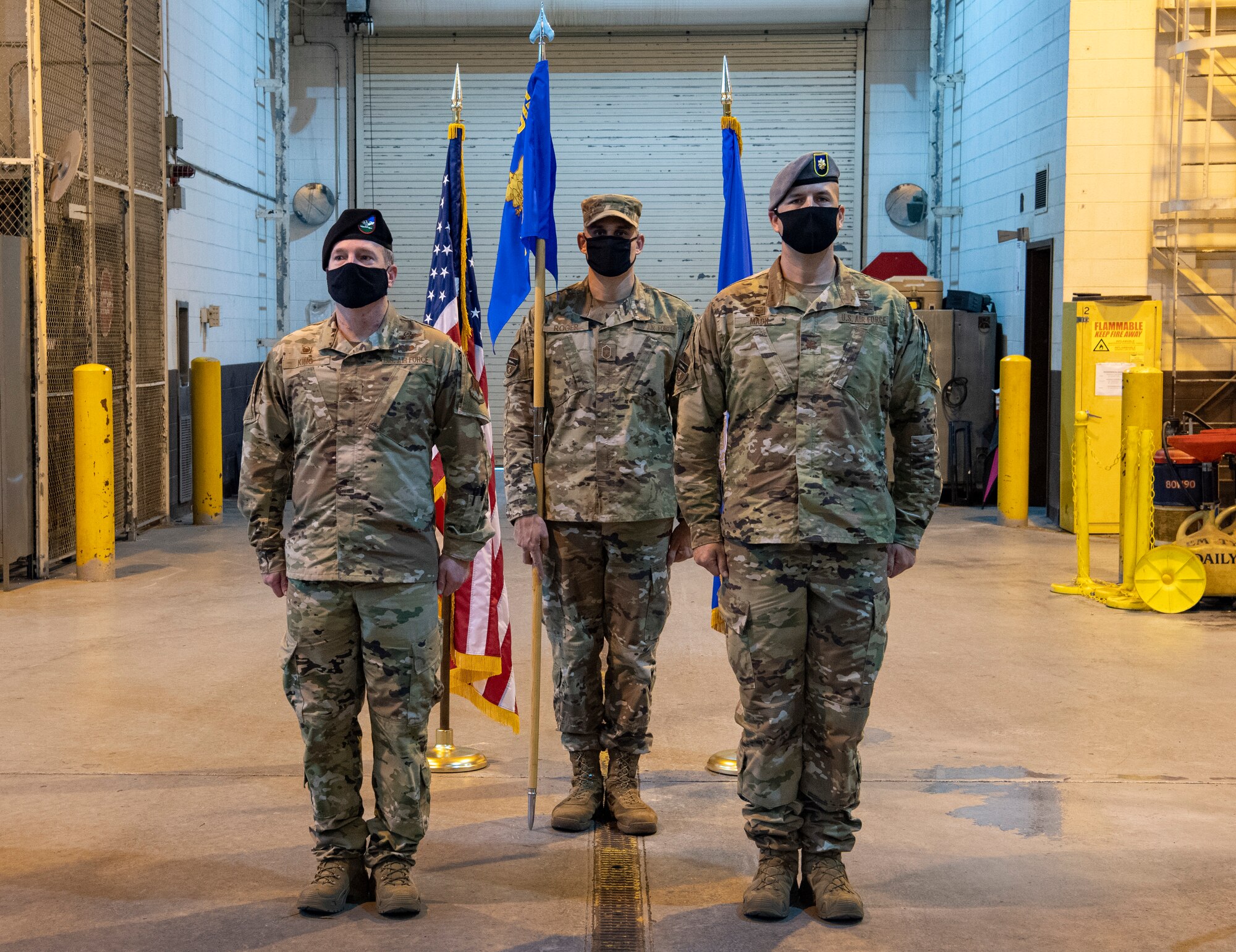 squadron leaders stand at attention