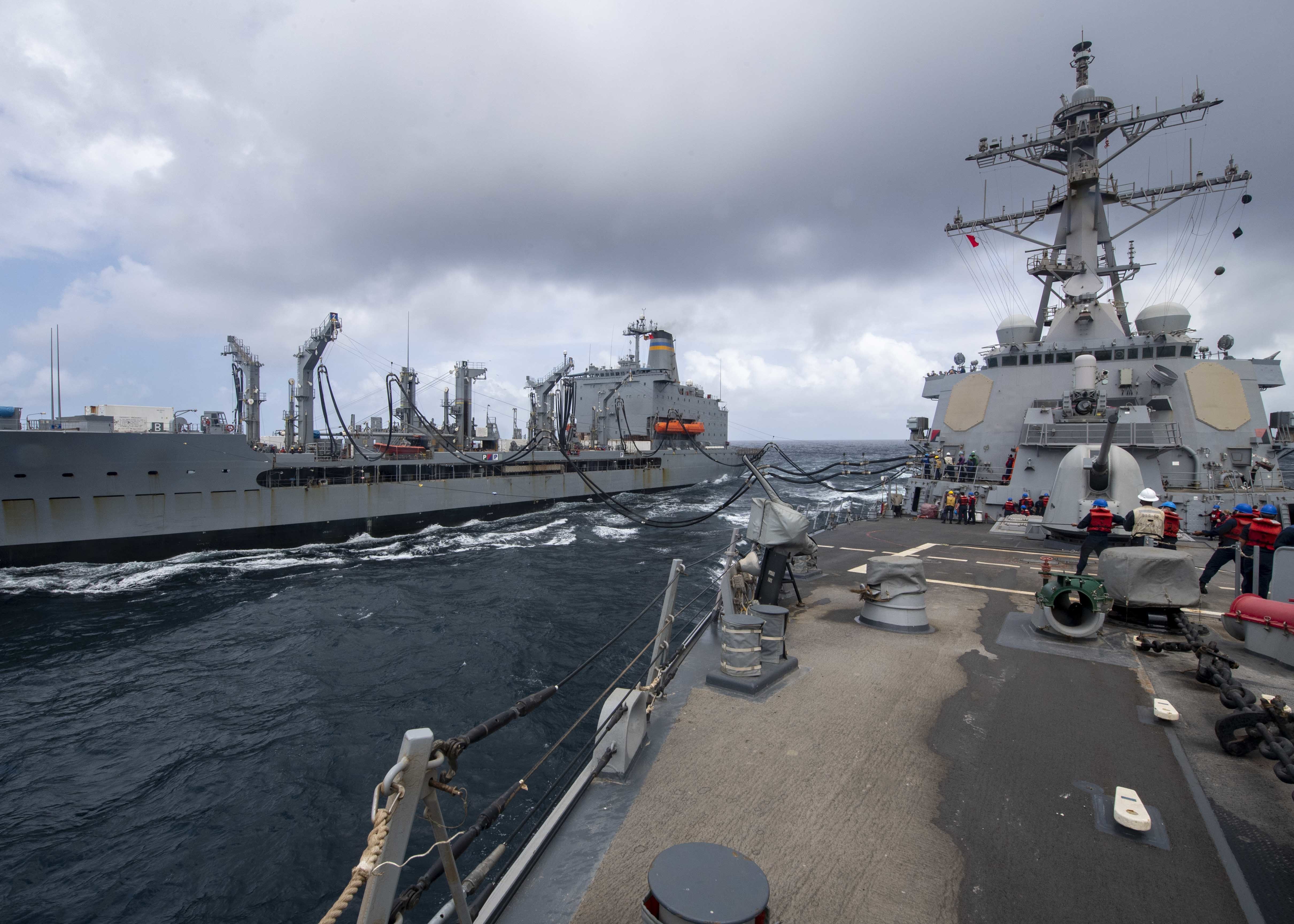 The guided-missile destroyer USS Paul Hamilton (DDG 60) conducts a replenishment-at-sea with the Military Sealift Command fleet replenishment oiler USNS Yukon (T-AO 202) in the Arabian Sea.