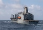 The Military Sealift Command fleet replenishment oiler USNS Yukon (T-AO 202) prepares to conduct a replenishment-at-sea with the guided-missile destroyer USS Paul Hamilton (DDG 60) in the Arabian Sea.