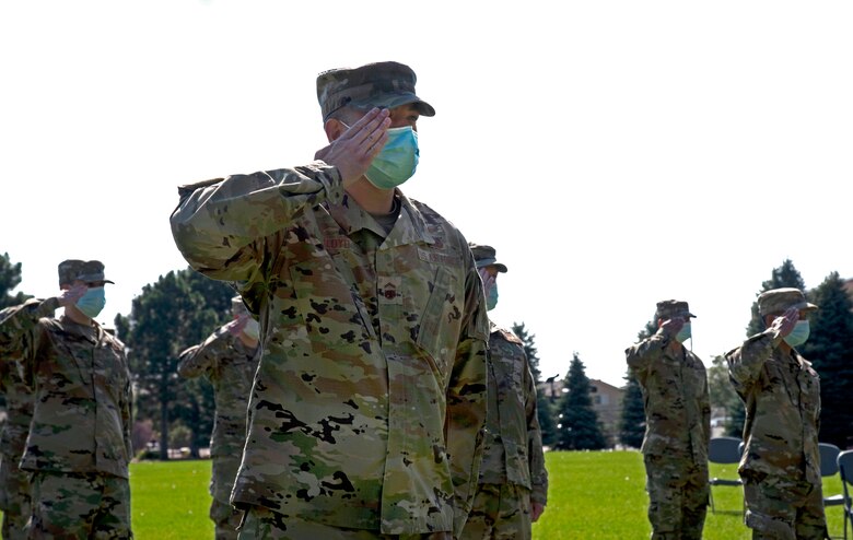 Members of the 72nd Intelligence, Surveillance and Reconnaissance Squadron give their new commander, Maj. Kimberly Templer, her first salute during an activation ceremony at Peterson Air Force Base, Colorado, Sept. 11, 2020. Delta 7 activated the 71st and 72nd ISRS and detachments under those squadrons during the ceremony. (U.S. Space Force photo by Kristen Allen)