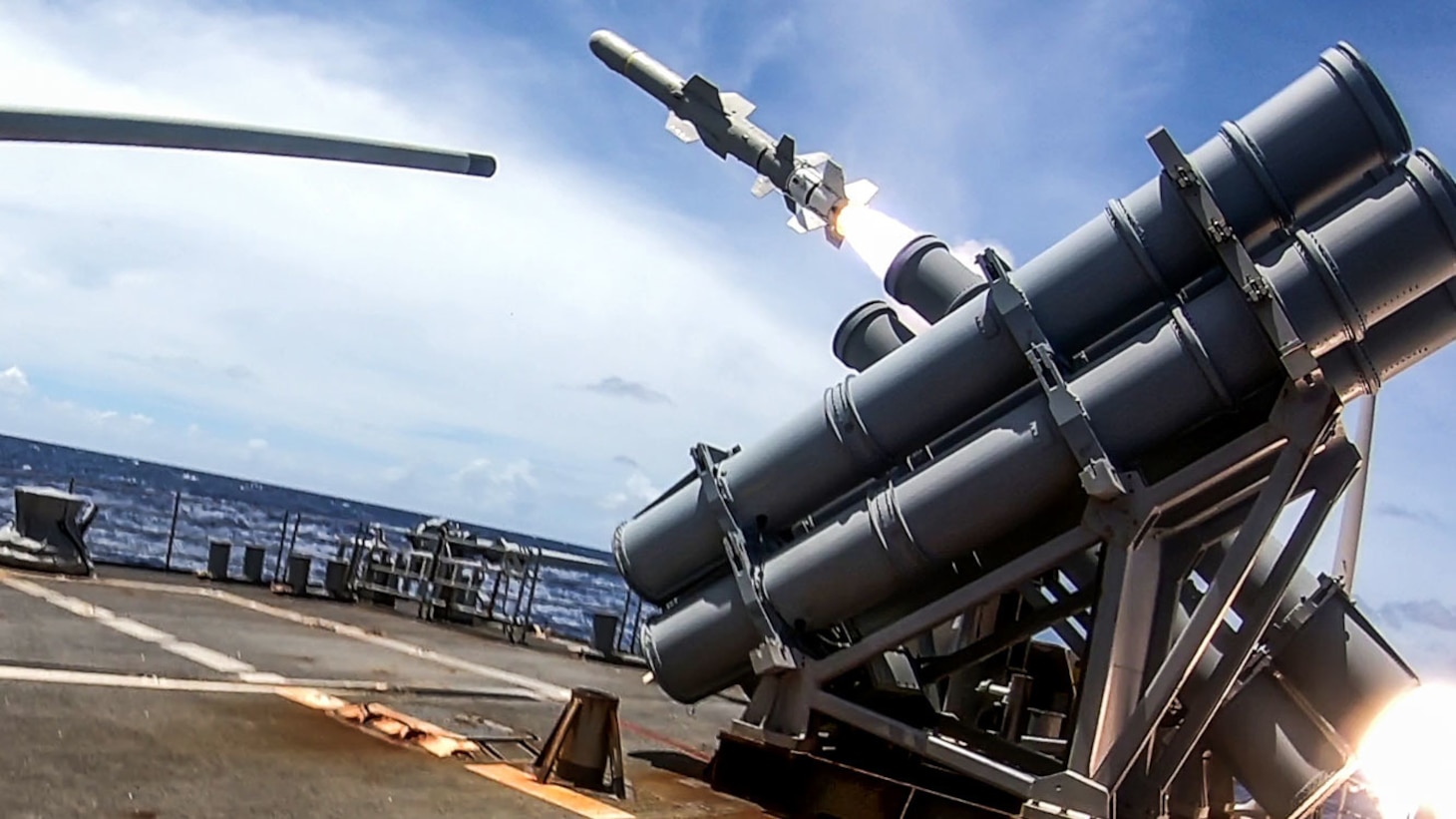 PACIFIC OCEAN (Sept. 19, 2020) -- Ticonderoga-class guided-missile cruiser USS Antietam (CG 54) launches a Harpoon surface-to-surface missile as part of a joint force sinking exercise (SINKEX) targeting the decommissioned frigate USS Curts (FFG 38) during Valiant Shield 2020. Valiant Shield is a U.S. only, biennial field training exercise (FTX) with a focus on integration of joint training in a blue-water environment among U.S. forces. This training enables real-world proficiency in sustaining joint forces through detecting, locating, tracking and engaging units at sea, in the air, on land and in cyberspace in response to a range of mission areas. (U.S. Navy photo by Mass Communication Specialist 3rd Class James Hong)