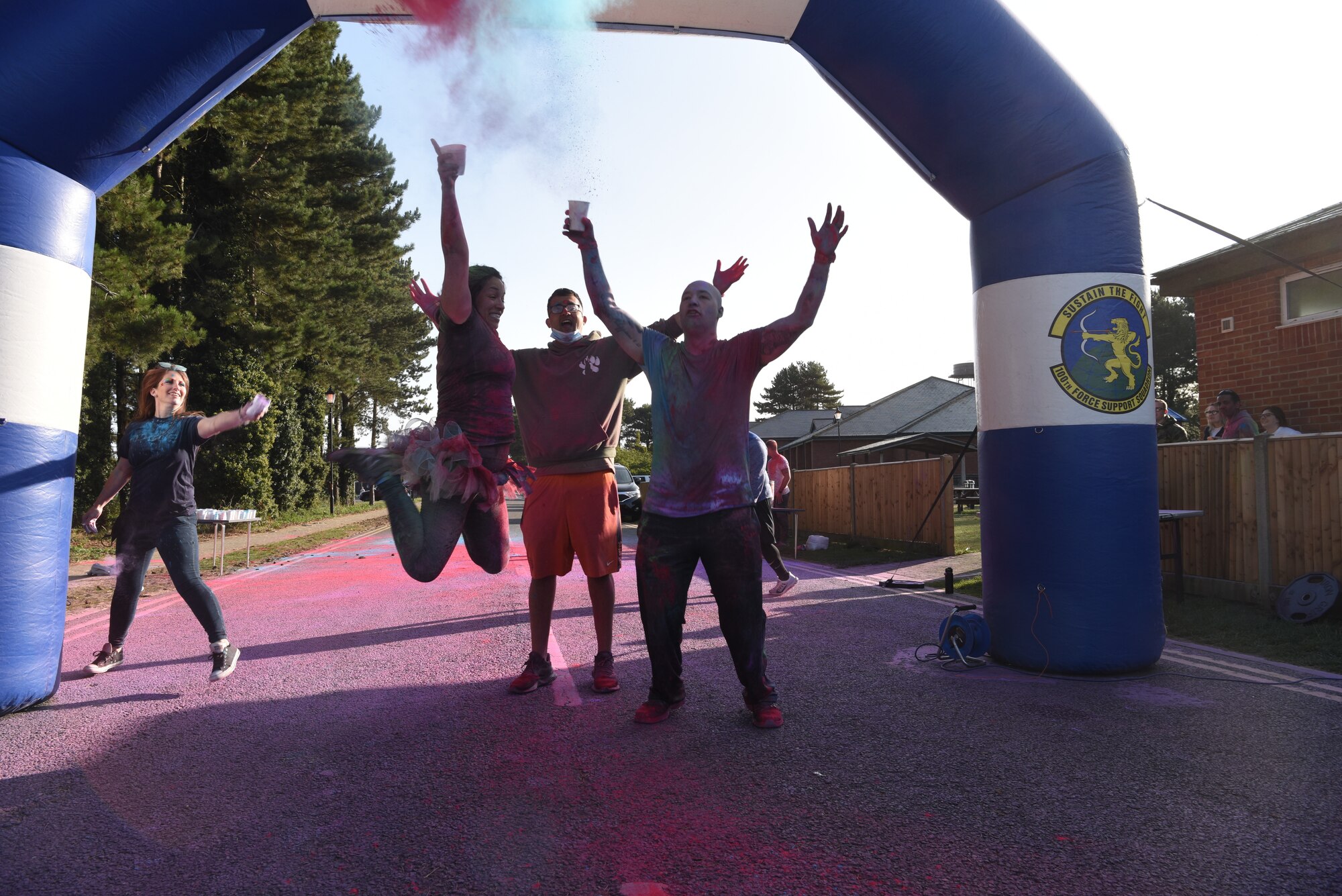 eam Mildenhall Airmen celebrate at the finish line during the 5K Color Run for Equality at Royal Air Force Mildenhall, England, Sept. 18, 2020.