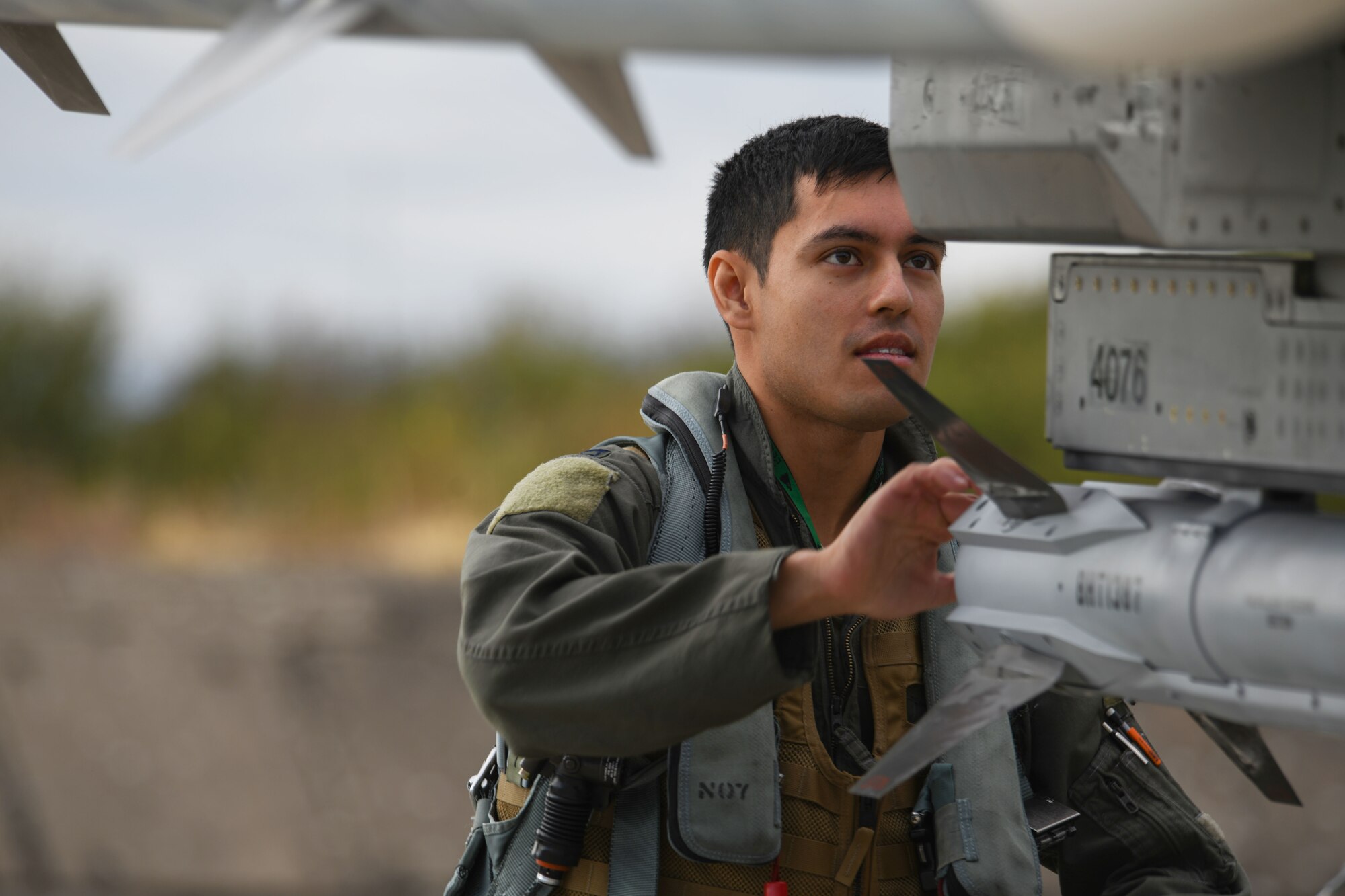 A U.S. Air Force pilot from the 555th Fighter Squadron, Aviano Air Base, Italy, performs a pre-flight check on a U.S. Air Force F-16 Fighting Falcon at Graf Ignatievo Air Base, Bulgaria, Sept. 21, 2020. This exercise required all levels of a squadron to deploy small teams of Airmen and aircraft for a short amount of time to hone their skills. Thracian Viper 20 also enhanced their ability to rapidly deploy to a remote location, establish command and control and deliver lethal airpower more effectively and efficiently anywhere in the world. (U.S. Air Force photo by Airman 1st Class Ericka A. Woolever)