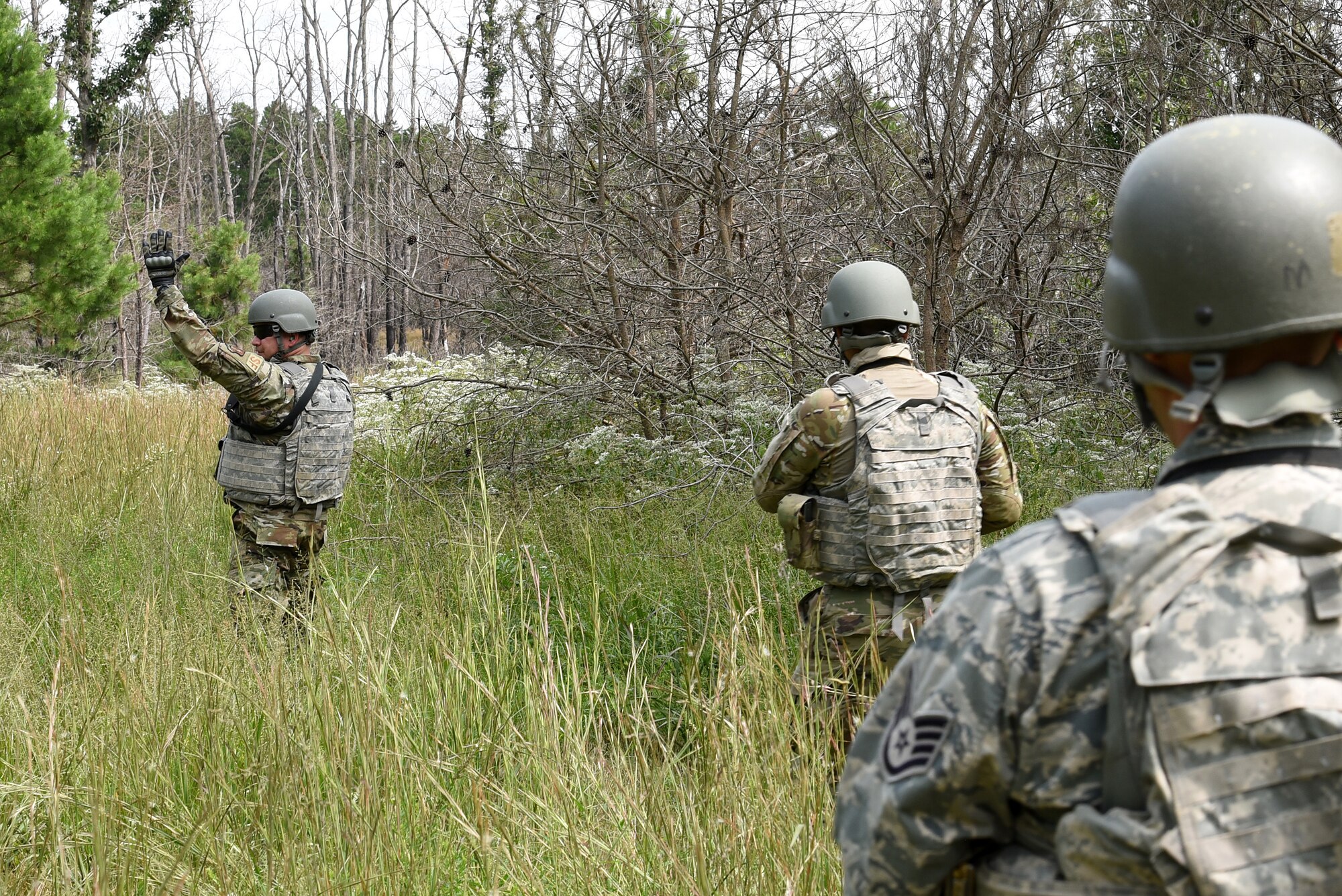 Photo of Airmen performing fire team drills during Fieldcraft Contingency Response Training.