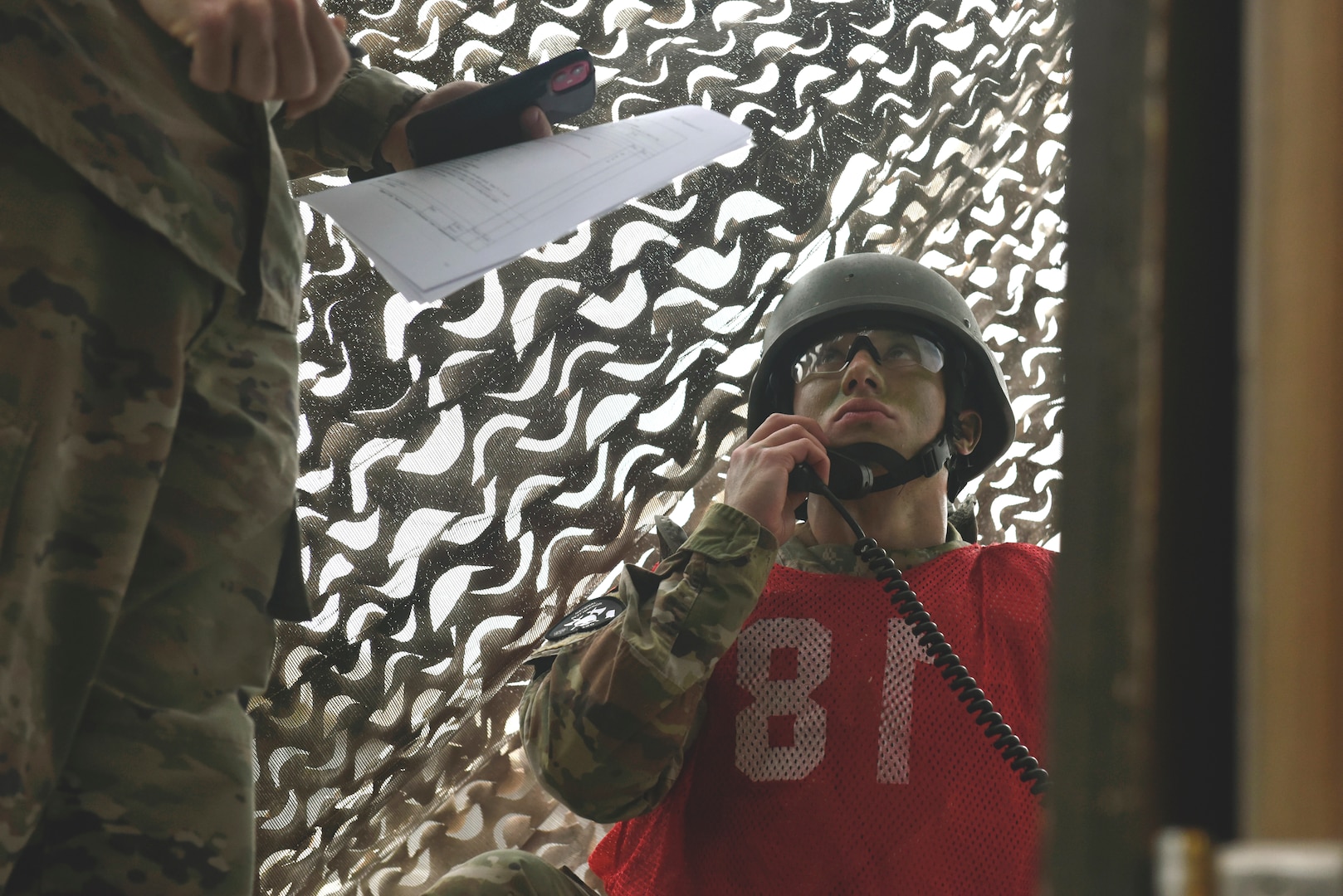 Army Staff Sgt. Anthony Miller, a rifle squad leader with C Company, 2nd Battalion, 130th Infantry Regiment, listens to instruction during a voice communications exercise during the Army National Guard’s 2020 Best Warrior Competition at Camp Shelby, Mississippi, Sept. 16. Miller was one of 14 Soldiers competing in the event.