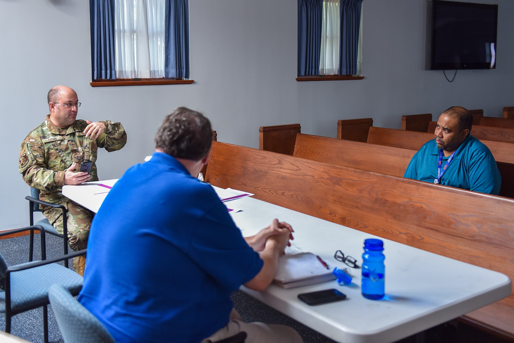LaBaron Stevens, military and family life counselor with the 911th Airlift Wing, Mike Hamilton, 911th AW personnel financial counselor and Senior Master Sgt. Christopher P. Flynn, 911th AW recruiting flight chief have a discussion during a Bible study at the Pittsburgh International Airport Air Reserve Station, Pennsylvania, Sept. 16, 2020.