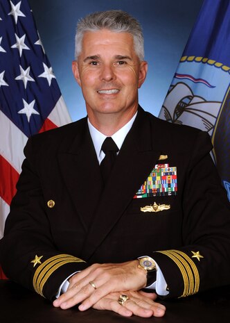 Official portrait of Cmdr. Joseph B. Harrison, the commanding officer of Cryptologic Warfare Activity (CWA) 66.