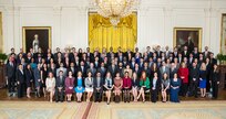 President Barack Obama joins recipients of the Presidential Early Career Award for Scientists and Engineers (PECASE) for a group photo in the East Room of the White House, May 5, 2016.