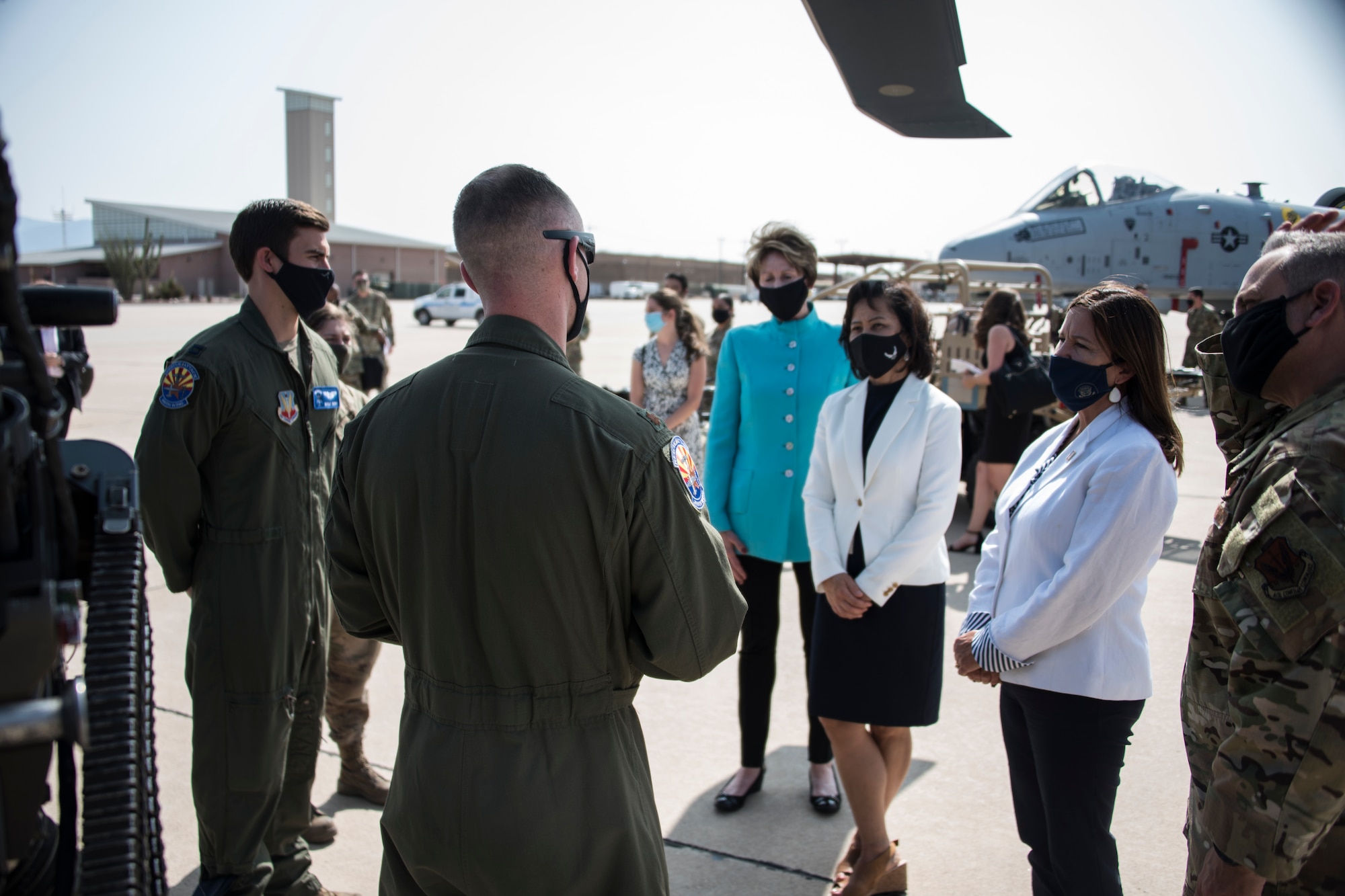 A photo of SLOTUS, SecAF and FLOTAF being briefed