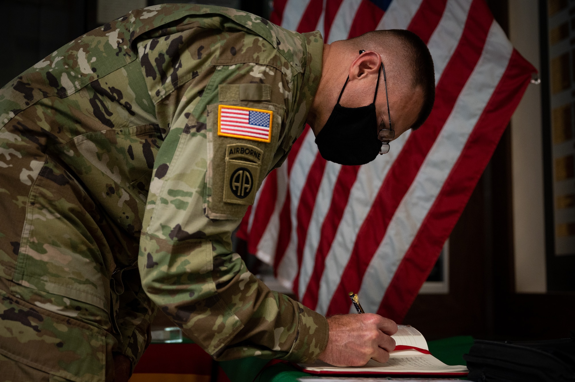 Col Thigpen signing Ground Zero Flag Team ledger