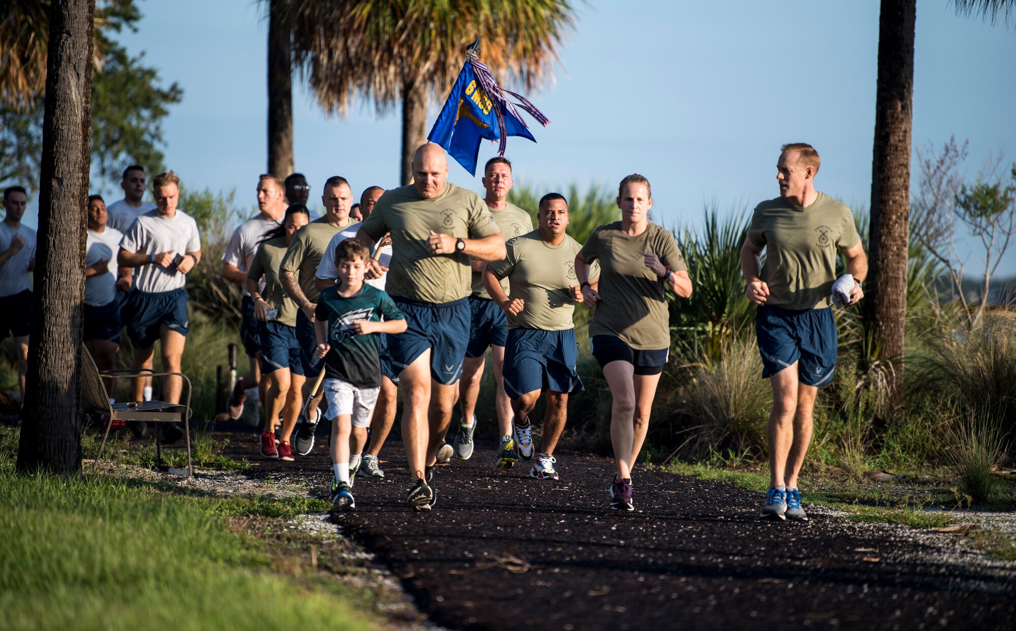 Members of Team MacDill run along Bayshore Blvd. during the 11th annual Helton Haul 5K run at MacDill Air Force Base, Fla., Sept. 18, 2020.