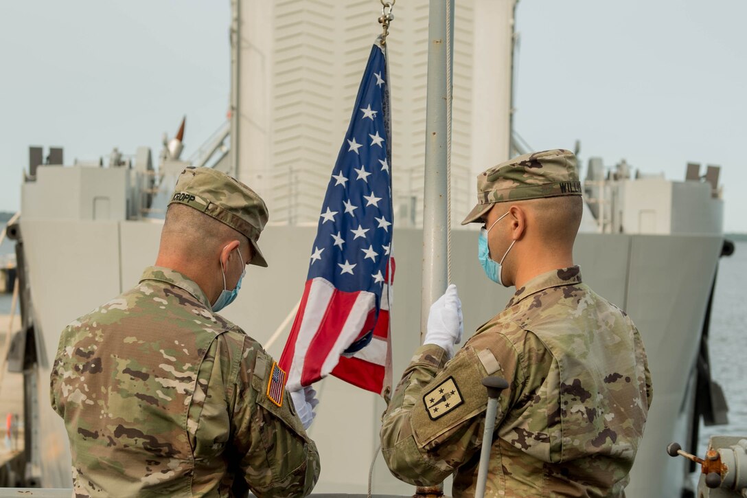 Soldiers raising Ground Zero Flag at Fort Eustis