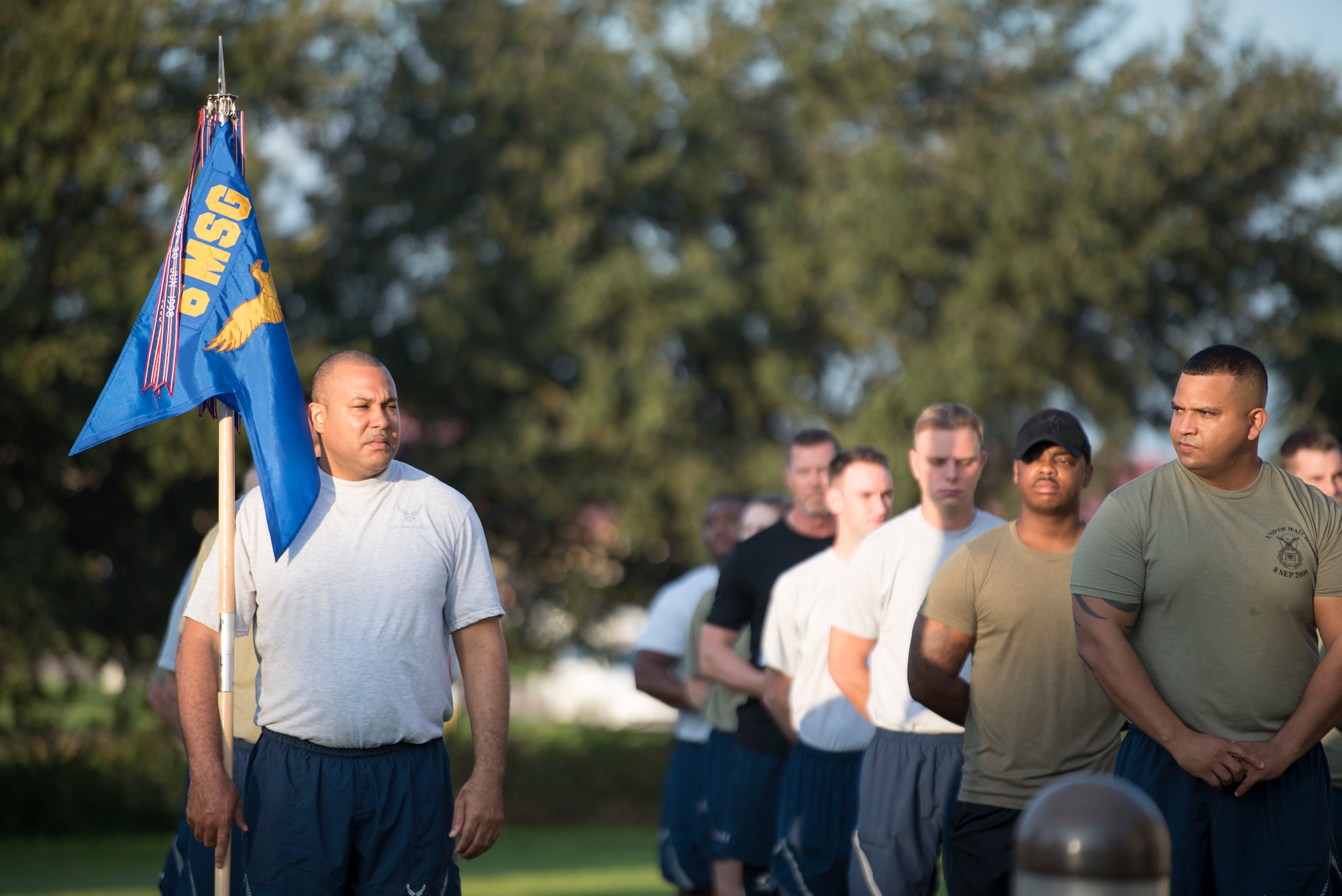 U.S. Airmen with the 6th Security Forces Squadron stand in formation before the 11th annual 1st Lt. Joseph D. Helton Haul 5K at MacDill Air Force Base, Fla., Sept. 18, 2020.
